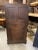 Handsome and stately hand carved English Tudor court cupboard. The top section with door with elaborately hand carved...