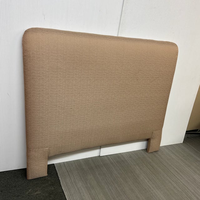 Design Plus Gallery presents a Full Size Upholstered Headboard with Matching Bedskirt. The headboard is tailored with...