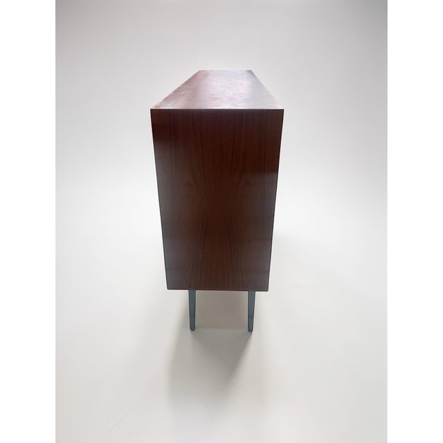 This elegant mid-century modern sideboard from the 1960s was produced by the german manufacturer rt möbel and bears the...