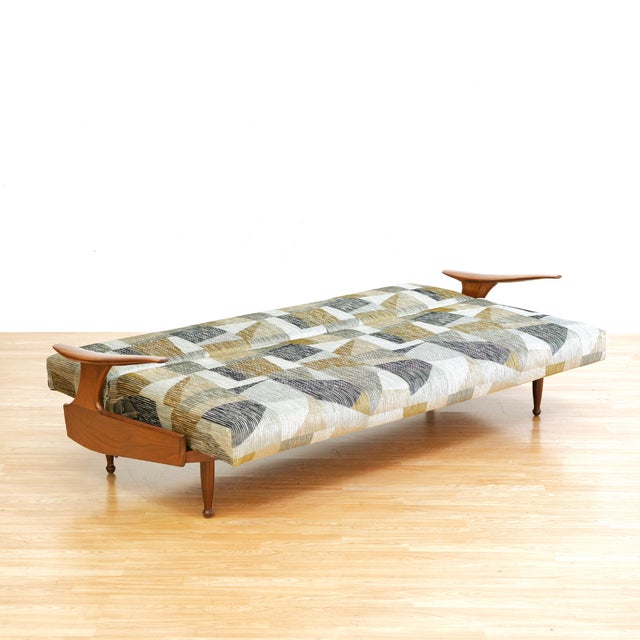 A stunning 1960s daybed by Greaves &amp; Thomas, UK. Produced in England during the 1960s, we have re-polished the...