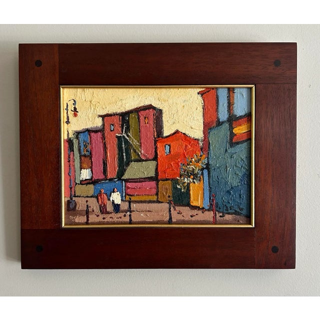 Vintage oil painting on board of an abstract street view with bright colors. Painted by listed artist Rodolfo Jara. Nice...