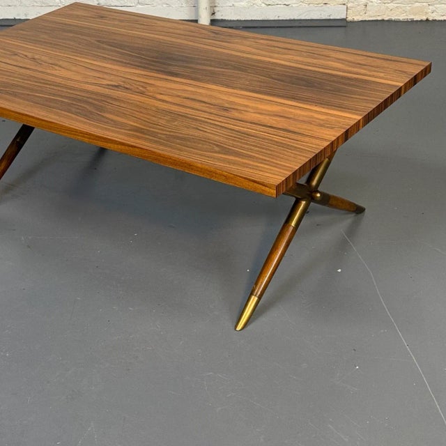 Macassar modern style x base coffee table.by Keno Brothers for Theodore Alexander, recognized for their modern classic and...