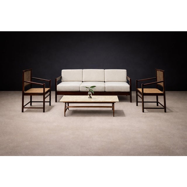 Produced in Brazil during the 1960s, this pair of armchairs reflects the restrained material sensibility and structural...