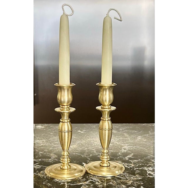 This vintage pair of 6.5” brass, candle stick holders, may be demur in size, but they are heavy on brass—weighing 18 oz....