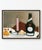 This vintage French still life art print by Henri Rousseau features a distinctive pink candle arranged beside a dark green...
