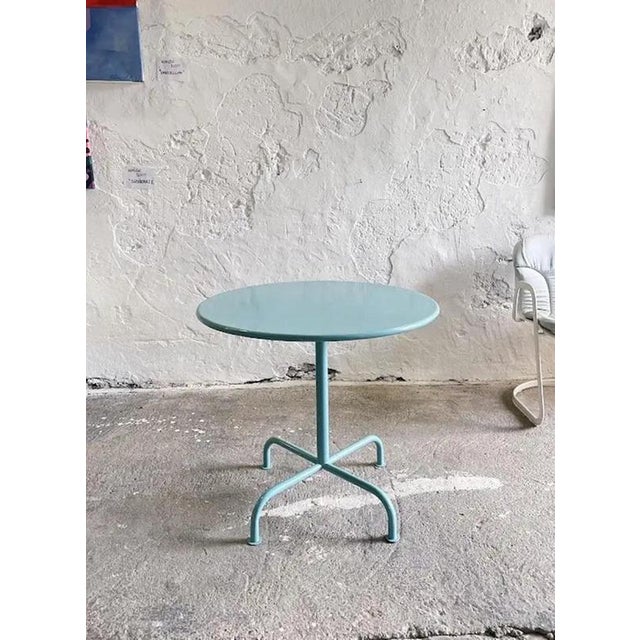 This elegant and rare garden table, designed by Swiss architect and designer Max Ernst Haefeli and produced by Embru Werke...