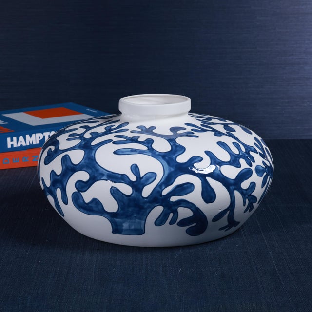Inspired by the serene beauty of the ocean, the Bermuda Coral Stoneware Vase is a striking decorative piece that combines...