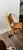 This is a vintage wooden slatted folding chair, similar to styles produced by ACME or Paris Manufacturing Co. The folding...