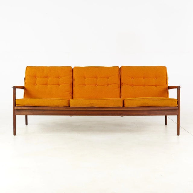 Kofod Larsen for Selig Mid Century Walnut Sofa This sofa measures: 75 wide x 30 deep x 30 inches high, with a seat height...