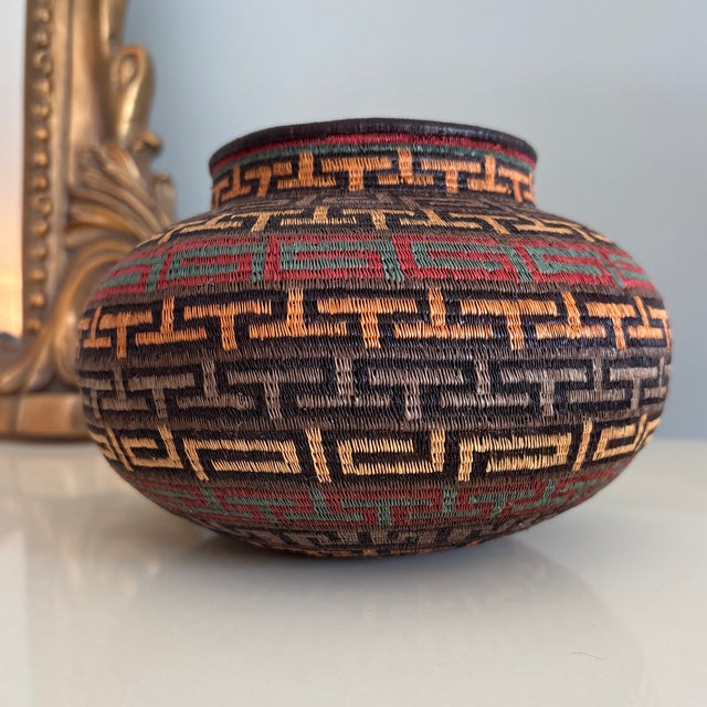 Stunning and colorful Wounaan Rainforest Basket in an architectural grid pattern. Hand woven from the finest palm fibers,...
