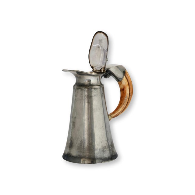 A handsome late 19th century English silverplate ale pitcher fitted with a beautifully figured natural staghorn handle....