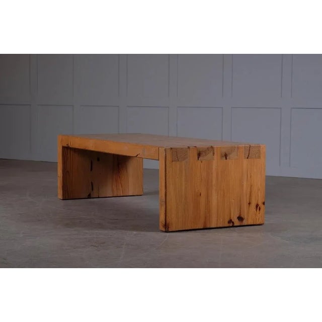 Handcrafted solid pine coffee table / bench. Designed by Roland Wilhelmsson and executed by the hand of the artist in...