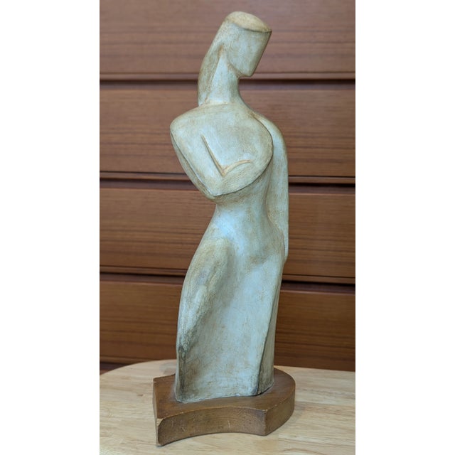 A sculptural abstract female form by J. Fohr, produced in the 1960s. Cast in plaster or ceramic with a faux-stone finish...