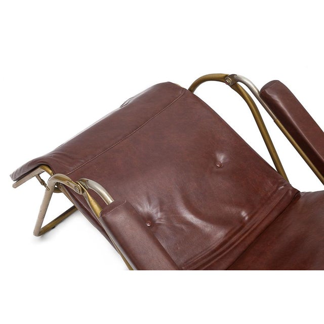 Foldable lounge chair in faux leather. Transat spirit. Tubular reinforcement and original coating in perfect condition....