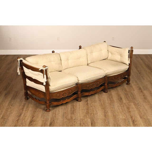 Elegant French Provincial Style Sofa Featuring a Carved Oak Wood Frame with Shaped Crest Rail, Turned Posts, and...