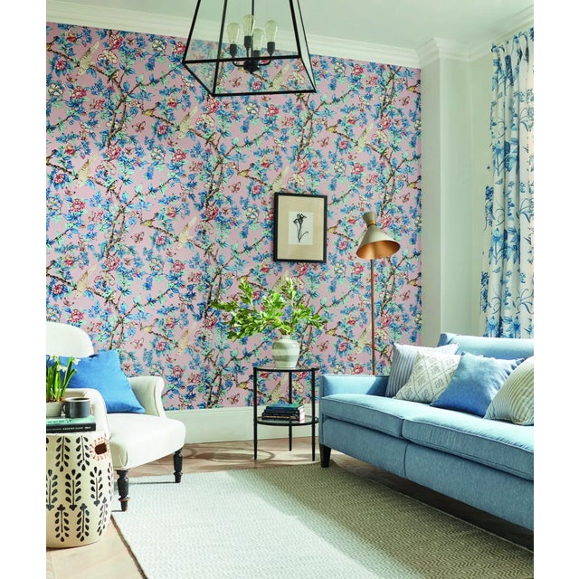 Caverley - Based on an early 19th century hand block print and typically English in style this wallpaper depicts charming...