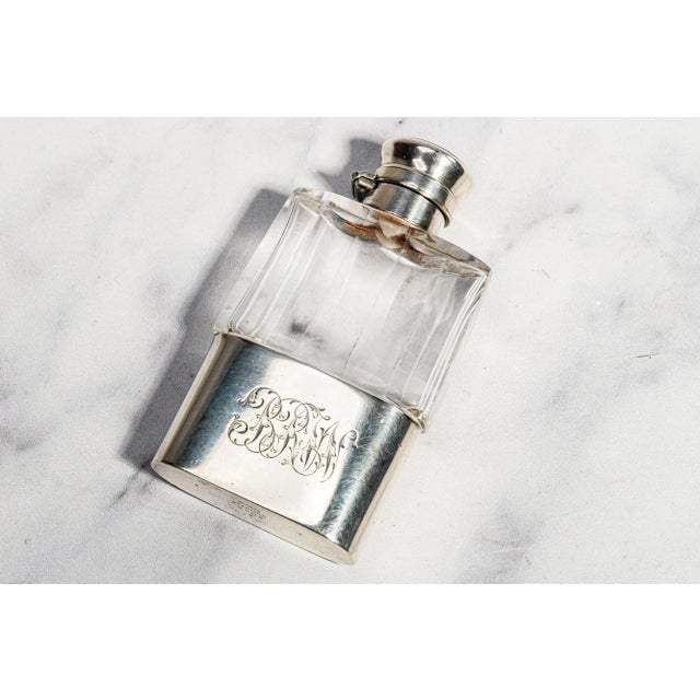 A refined treasure in miniature form, this exquisite antique faceted crystal flask is a timeless piece of craftsmanship...