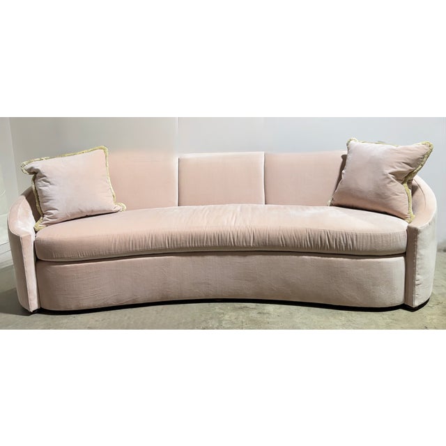 Crescent shaped curved sofa in very plush. blush colored velvet. Spring down seat cushion and tight back. Includes two 22"...