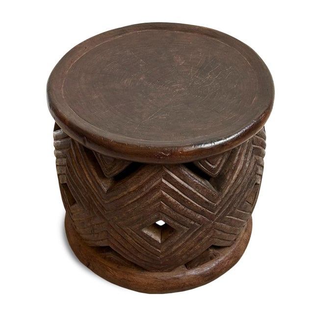 Authentic vintage hand carved Bamileke tribal wood stool/side table. Masterfully crafted from one piece of indigenous...