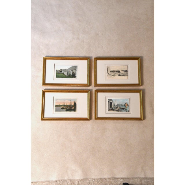 A vintage postcard, "A Memory of Old Nantucket," from a collection depicting cottages, harbors, and sailboats around...