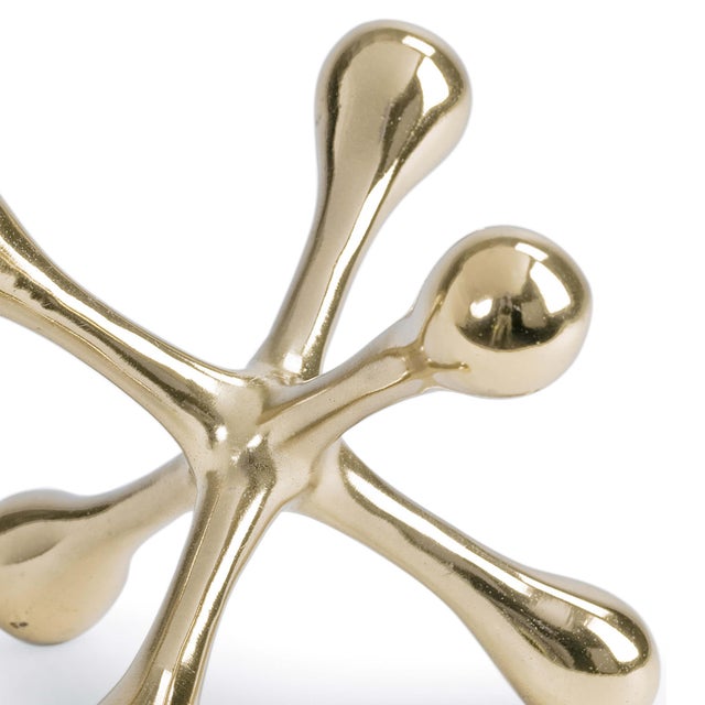 Add some bold yet playful flair with this oversized accent piece, giving homage to a timeless game with serious style.