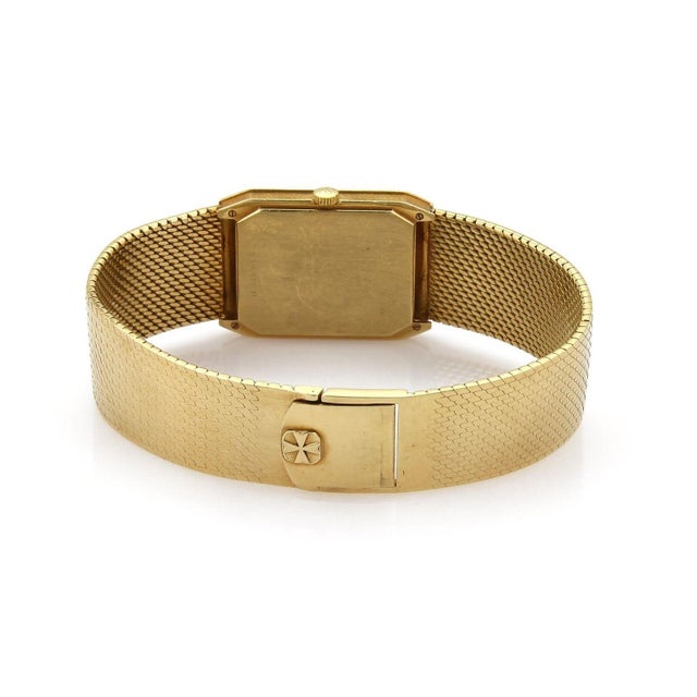 This is an authentic men's wrist watch from Vacheron Constantin, the case and band is crafted from 18k yellow gold, long...