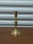 Elevate your mantel or dining landscape with this stunning set of four vintage solid brass candlestick holders,...