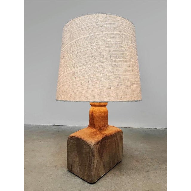 Illuminated! Will this unique, sleek table lamp soon be proudly displayed in your home? Country of origin: Denmark....