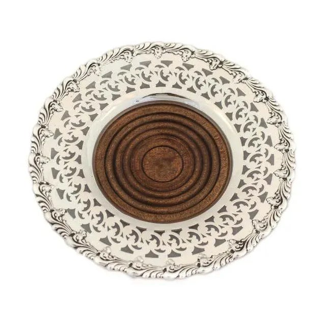 We are thrilled to offer you this pair of sterling silver wine coasters by Black Starr & Frost. They have a 2.5” sterling...