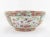 Early 20th-century export porcelain Cantonese-style Famille Rose bowl The bowl's interior and exterior are painted with...