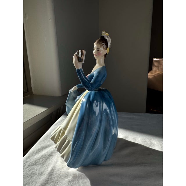 “Leading Lady” (H.N. 2269), introduced by Royal Doulton in 1956, is a finely modeled bone china figurine from the H.N....