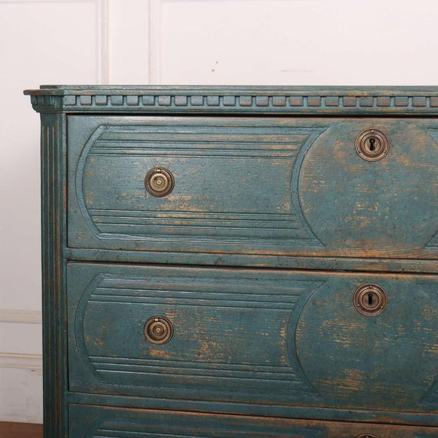 Swedish early 19th C pine painted commode with carved drawer front. 1820 This piece is designed in the style of the...