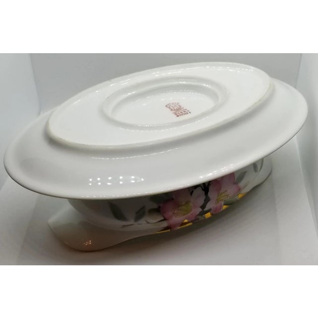 We love this extraordinary Japanese Noritake white china gravy boat with attached underplate for the lovely condition,...