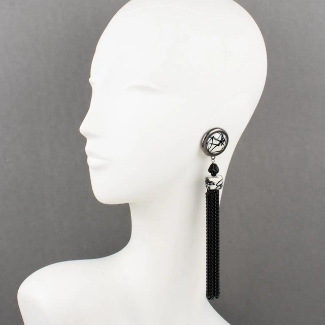 These lovely Paco Rabanne Paris futuristic clip-on earrings feature an oversized shoulder-duster dangling drop shape with...