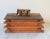 Vintage handmade rustic log cabin tissue box cover with stone chimney. No makers mark. Minor age wear.