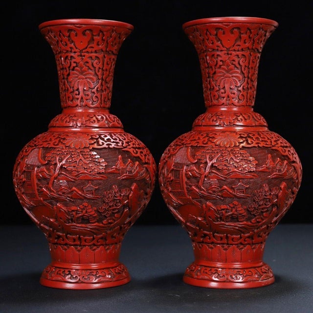 This pair of vintage Chinese cinnabar lacquer vases is an exquisite addition to any collection. Each vase features...
