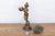 This exceptional antique figurine stands as a magnificent tribute to classical Indian spiritual sculpture. Hand-cast by...