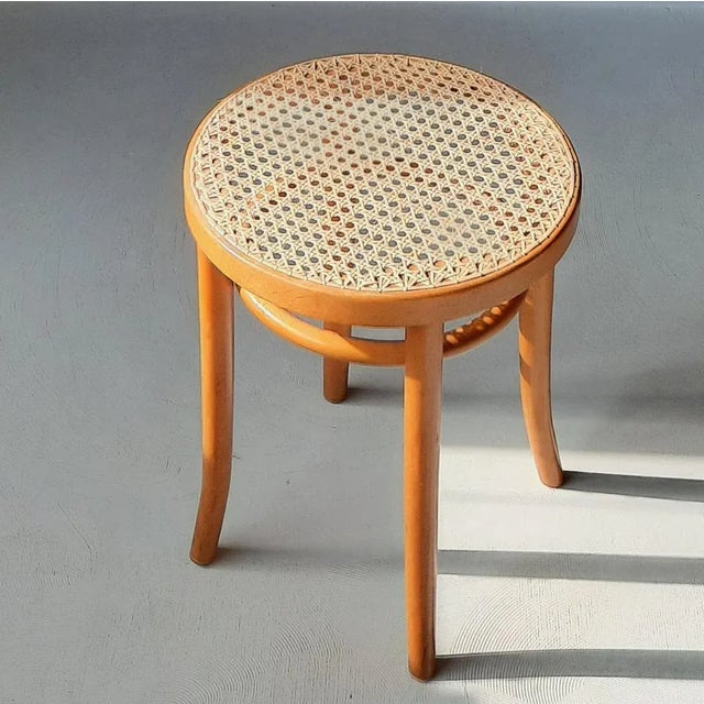 This bentwood stool was manufactured in Romania in the 1960s/1970s. Romanian quality stamp underneath the seat.