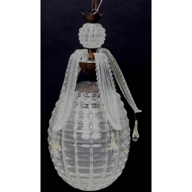 A wonderful Mid-Century Italian Modern Venetian Murano art glass sculptural pineapple-form single-light ceiling lamp....