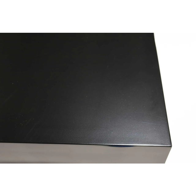 An iconic dining table Attributed to Milo Baughman for Directional, this masterpiece embodies the elegance of mid-century...