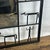 Exceptional Iconic 1950s Frederick Weinberg Style Wrought Iron Brutalist Wall Mirror The interior mirror is framed by 14...
