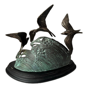 Vintage Bronze Sculpture of Three Seagulls in Flight Over a Wave