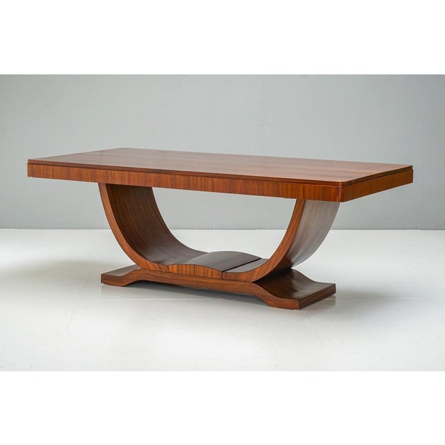 Large mahogany art deco style centre table. Re-finished. france circa 1940 h 75cm x w 200cm x d 100cm x ah 64cm this piece...