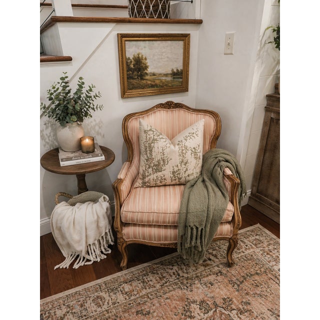 Elevate your space with this beautifully crafted vintage bergère-style armchair by Meyer Gunther Martini. Featuring an...