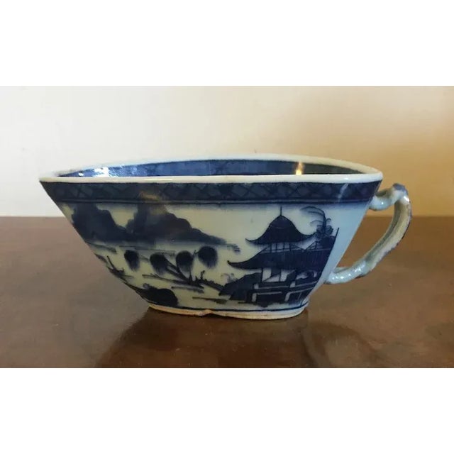 Antique early 19th century Chinese export Canton porcelain sauce or gravy boat decorated with a continuous blue & white...