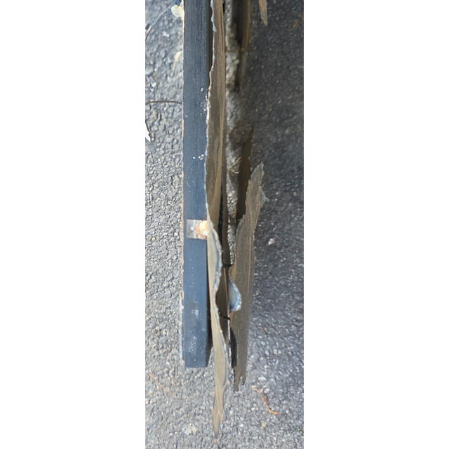 This Midcentury Industrial Brutalist hand-welded steel wall mirror, with its raw metallic surface and organically...