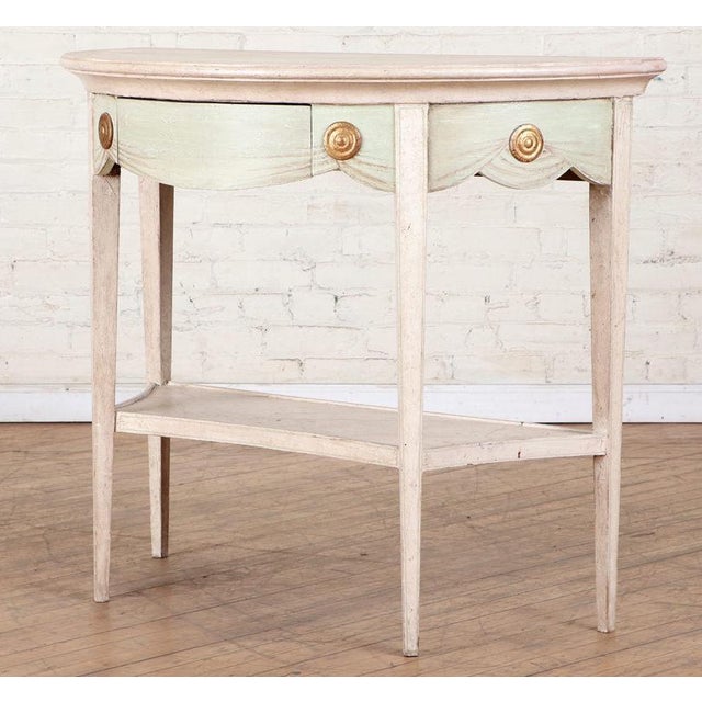 A beautiful Vintage, warm-ivory/pale blush and pale green painted dekmilune console table with gilt detailing. Directoire...