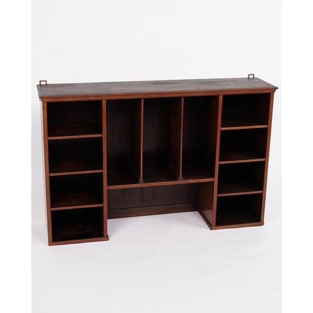 Antique wall-mounted bookcase in hand-polished mahogany from the 1890s. with shelf sections. — Period: 1890s — Type: Wall-...