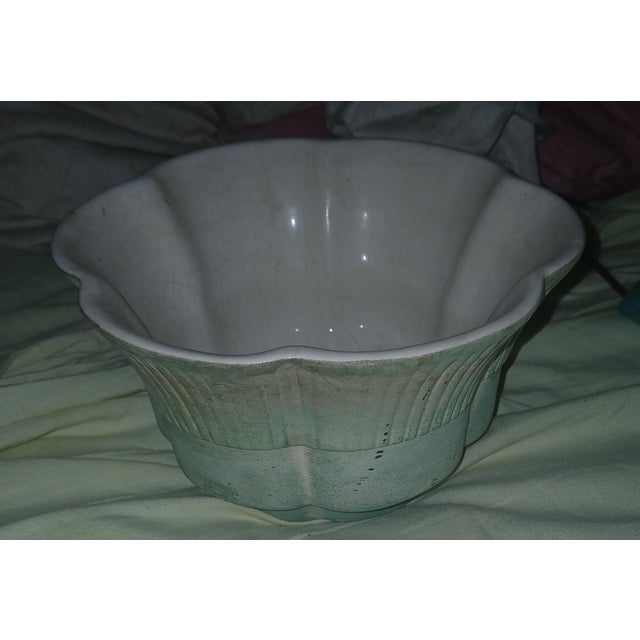 1940s Vintage ceramic planter or bowl by Haegar with a light green or turquoise matte glaze. Beautiful scalloped, flower-...