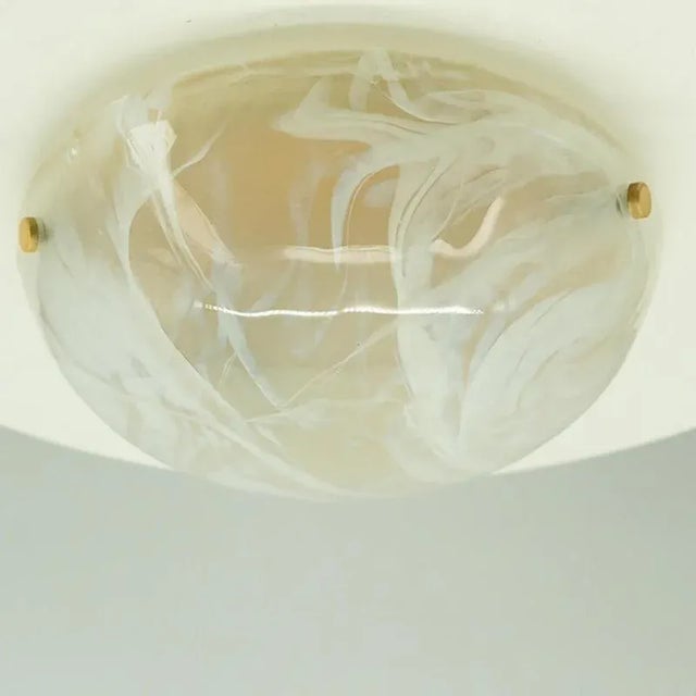 A wonderful high-end light with thick marbled blown glass. Manufactured in the 1960s. The glass of the light fixtures is...